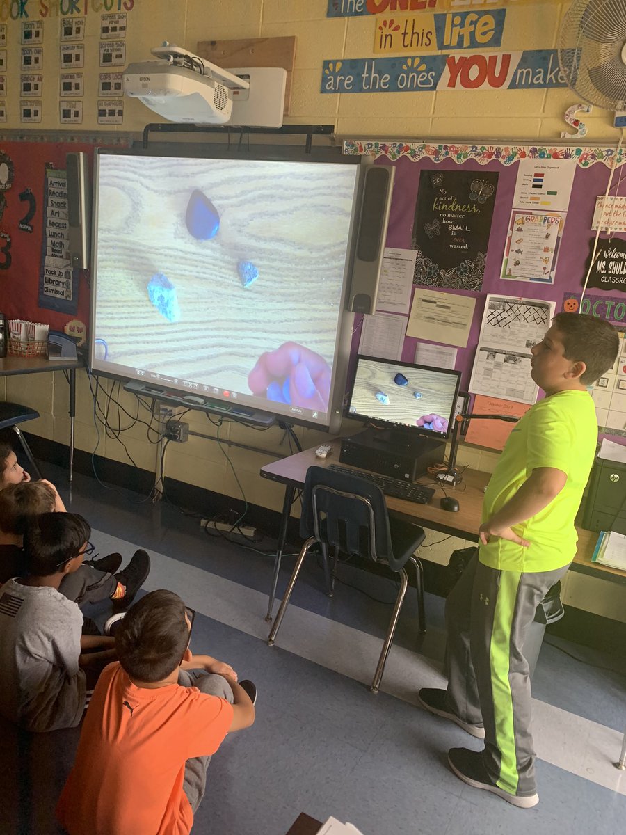 MsCareyCL's tweet photo. This scientist shared his rock collection with us during snack!! #GoCooper @jshuldiner @missrinck @School9E https://t.co/bOsZetpfMt