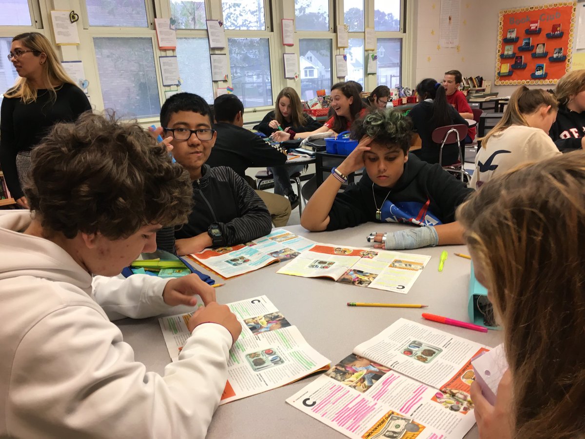 7th graders work collaboratively to read, annotate, and summarize current events. ⁦<a href="/AntrimSchool/">Tara Weber</a>⁩ #Beachatourbest