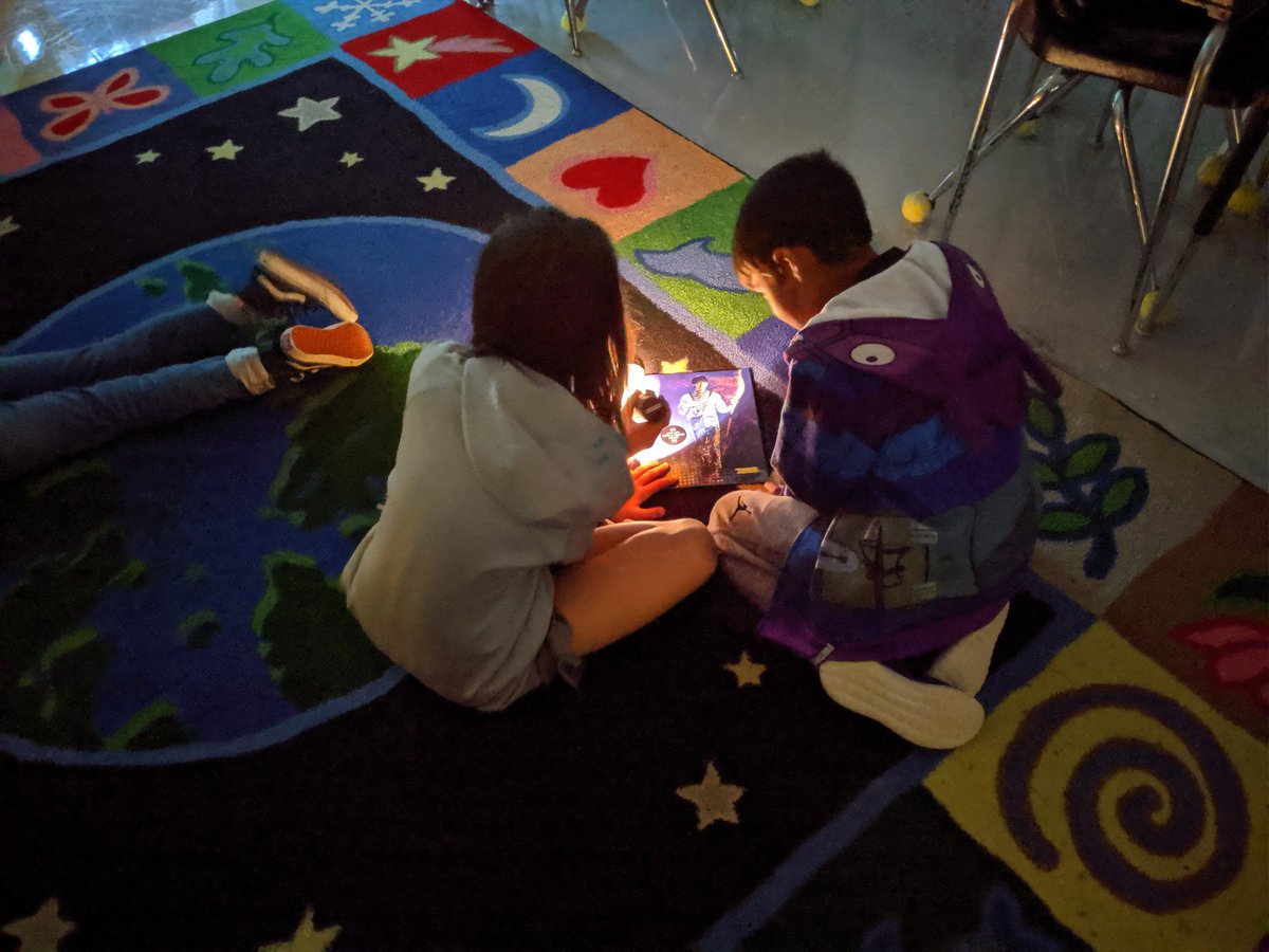 MrsCooperYES's tweet photo. A rainy day during our Read A Thon fundraiser = spontaneous Flashlight Buddy (or Solo) Reading!! @yes_falcons #ReadtoSOAR #engageYCSD https://t.co/6cYyRT72xy