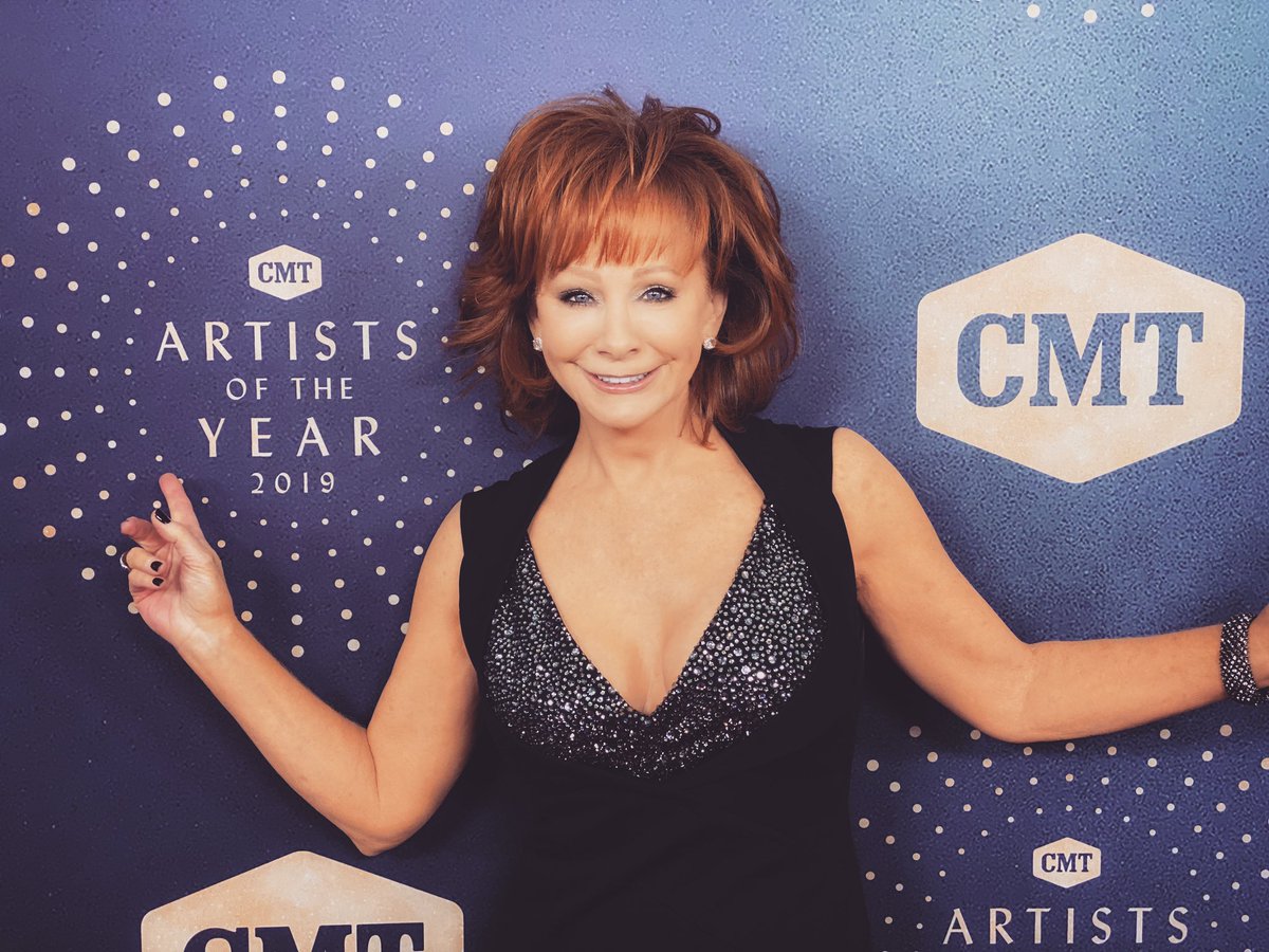 reba's tweet photo. Can’t wait for the #CMTAOTY show!!! Show time is at 8/7c on @cmt! https://t.co/0QRTgDTynZ