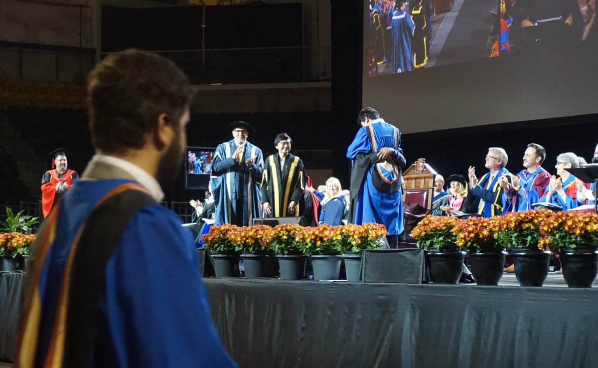 RUconvo's tweet photo. This graduate got congratulated by his father on stage.A truly touching moment✨
#RUConvo #Ryerson #Convocation https://t.co/cseSJUOhZf