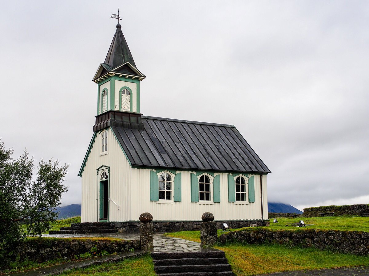 Þingvallakirkja is one of Iceland’s first churches. The original was consecrated in the 11th century, but the current wooden building dates from 1859. Inside are several bells from earlier churches, a 17th-century wooden pulpit and a painted altarpiece from 1834.