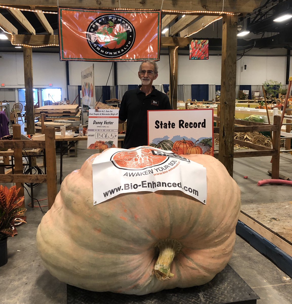 NCStateFair's tweet photo. Congratulations to Danny Vester of Spring Hope on his State Record pumpkin! 1506.5 lbs!! 🎃🎃 #ncstatefair https://t.co/PHuLzLf35t