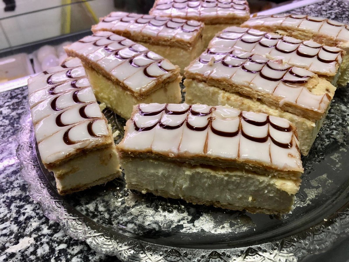 sally_sues's tweet photo. Today’s cake special @sally_sues Fresh cream slices https://t.co/J4rkh2D2Cl
