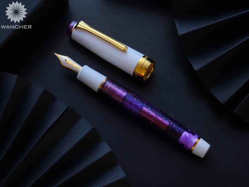 wancher_japan's tweet photo. WANCHER×SAILOR新作、ハーモニーシリーズ第2弾!
「パープルレイン」万年筆本日より予約販売を開始いたします!
紫の美しい透明ボディに降り注いだ雨
白と煌めく紫が織りなすハーモニー。
.
是非こちらよりご覧ください
https://t.co/dOZWYzXOqp
#purplerain #cocktail #harmonyseries https://t.co/clljCyOmGU