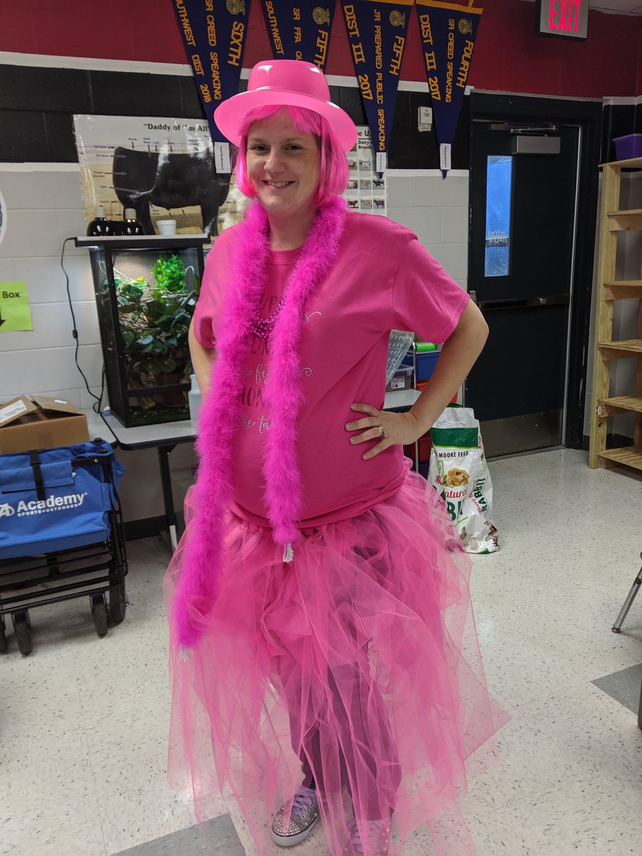 Amanda_R_H's tweet photo. Mrs.Godwin showing her support for breast cancer awareness month.  #THSPinkOut2019 #FreeStarbucks @THS_Tigers @ffa_travis https://t.co/39VUxsvS9W