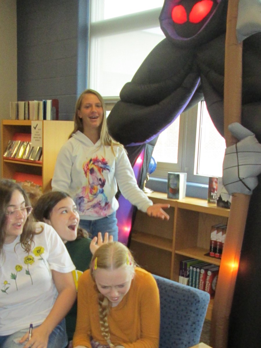 In the Media Center, 8th graders rediscover the thrill of selecting fantasy and horror books!