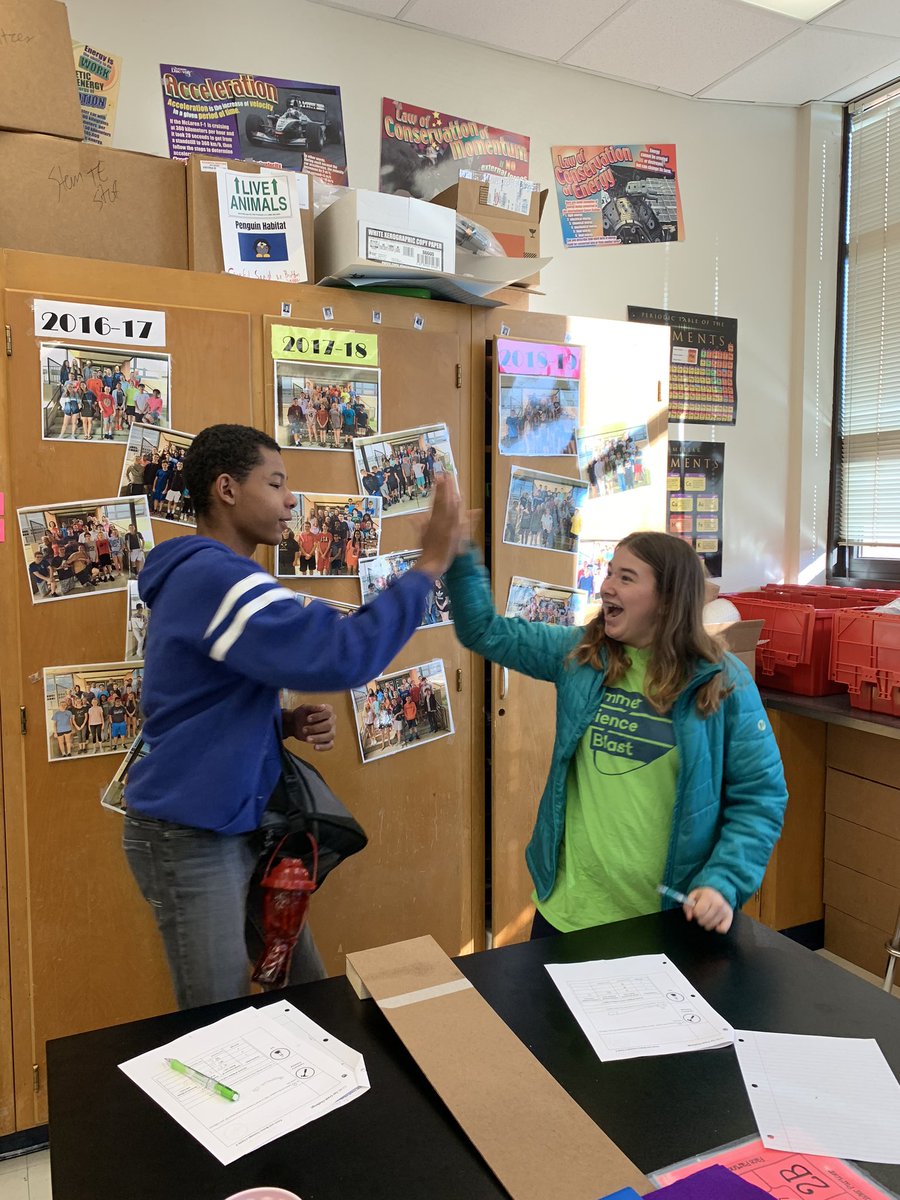 MissBunyard's tweet image. Group high fives when your collision cart challenge creation is successful! Students used a “$100 budget” to make modifications to ramps and carts to reduce the amount of force (water lost) in a collision. #cms8BlueScience