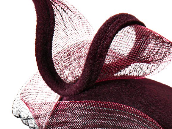 It's all in the detail, a close up detail from our Suvi design.  The design features a high double crin twist, using a matching colour to the base and a black pleated crin to add depth. Hand crafted in our Edinburgh studio.
#makinghats #millinery #couture