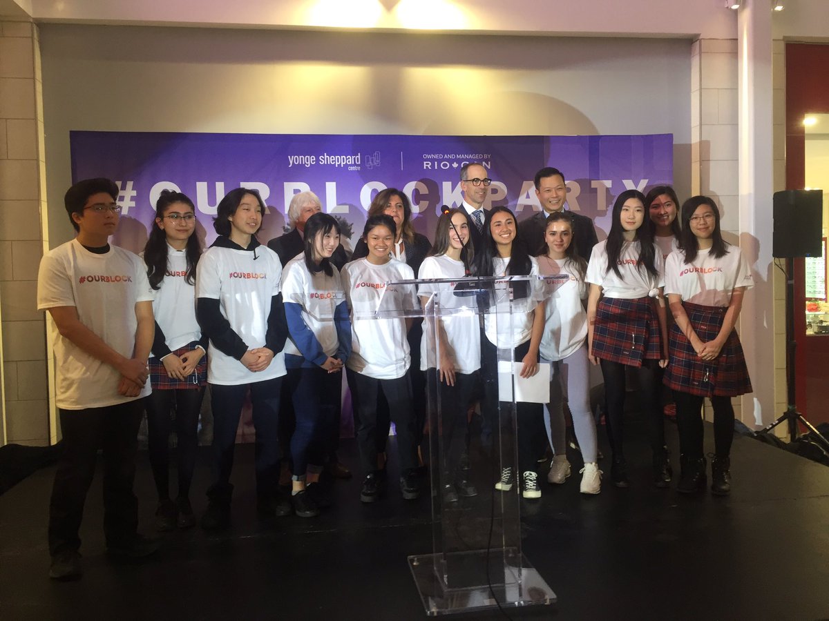 TCDSB's tweet photo. Students from @CCAATCDSB prepare for the unveiling of their new art installation at Yonge Sheppard Centre’s #OurBlockParty “This installation represents what our block means to us” https://t.co/IoaxnRV52e