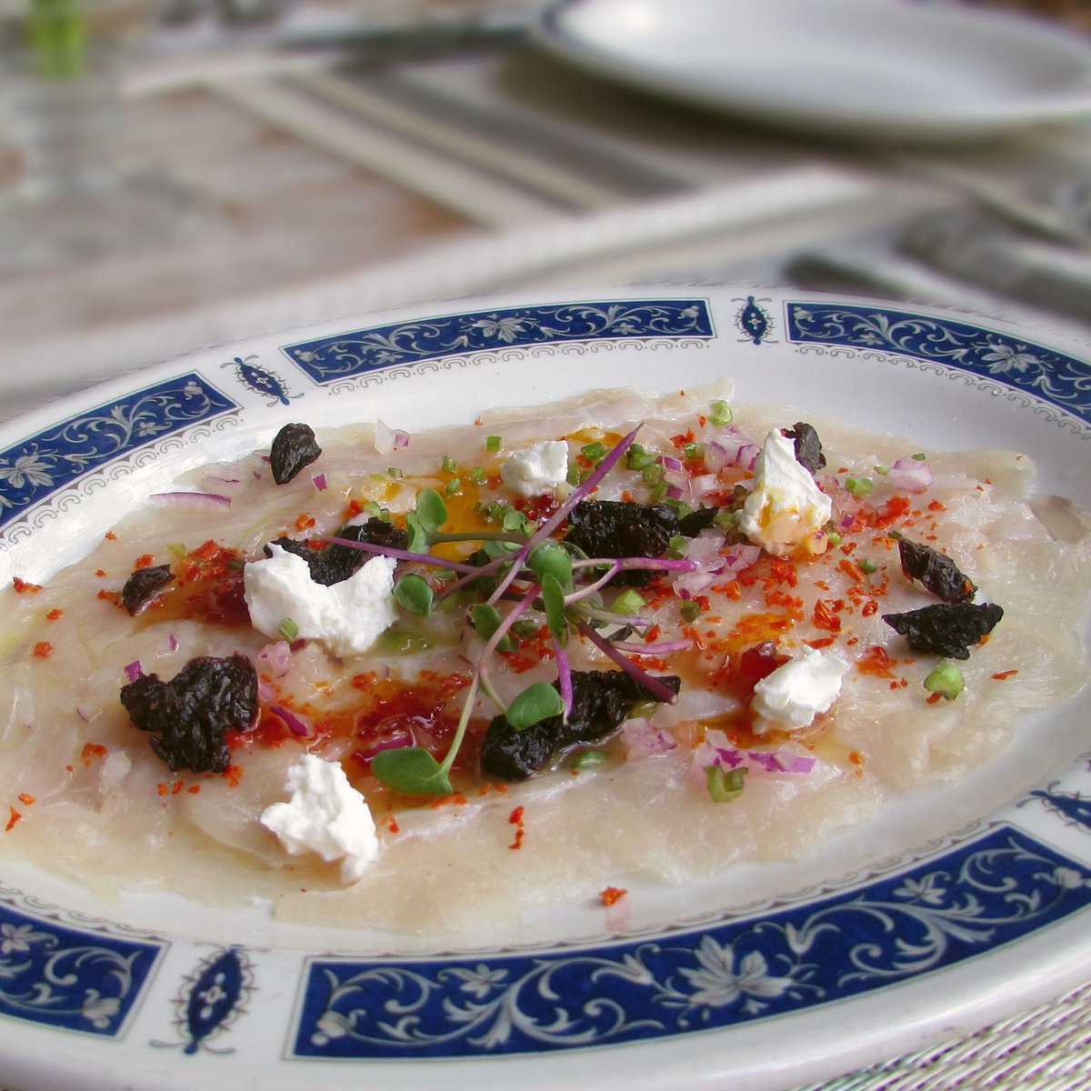 | Carpaccio de Pescado |

Marinado en vinagreta de naranja, ciruelas pasas, queso de cabra y mermelada de ají dulce margariteño, acompañado de casabe de la casa.

#GuillerminaRest #Venezuela #LaAsunción #CocinaVenezolana #Gastronomia #Turismo