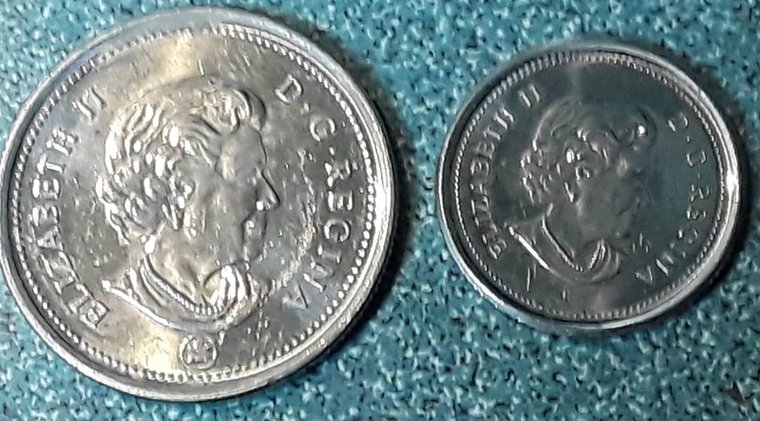 chadwicksirnio's tweet photo. BOOM! #freemoney in the Credit Union coin machine reject tray! These have been pretty dry as of late but I'll take 35 cents #Canadian! #keepcheckingthatchange #coinsforamateurs #coins #familyfun #foreigncoin https://t.co/S6vP3Fnesh
