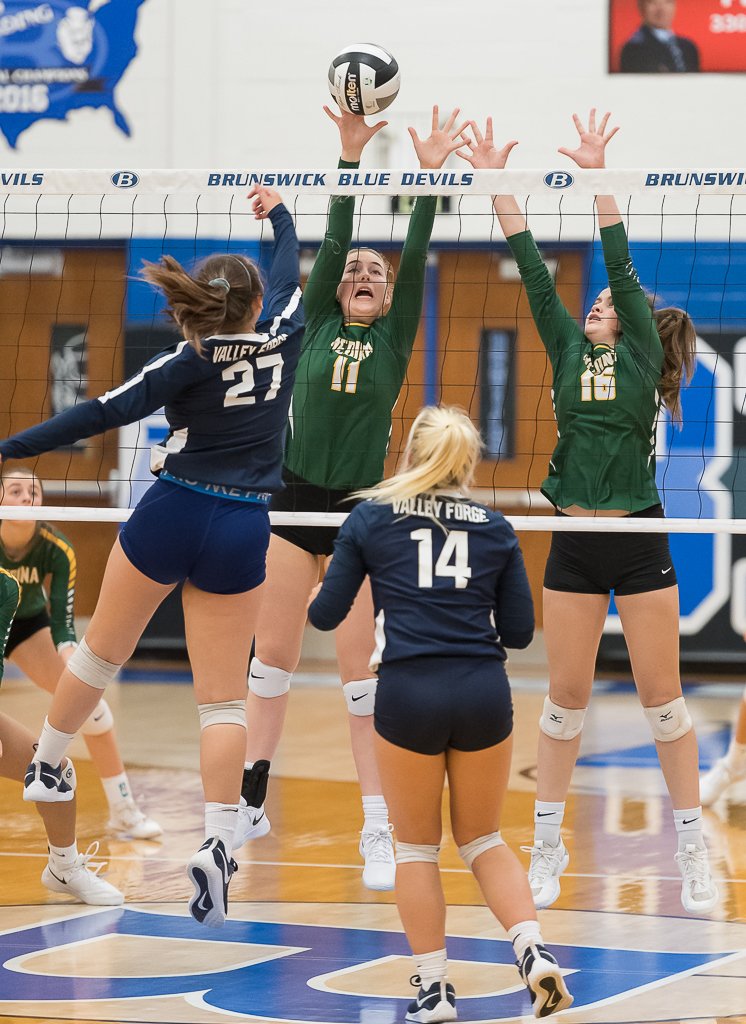 Medina's <a href="/gracemachalec/">Grace Machalec</a> gets the block against Valley Forge. <a href="/MedinaGrlsVball/">Coach Joe</a>