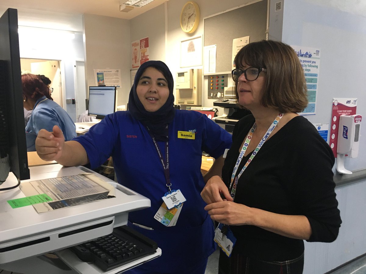 Chief Nurse Caroline Alexander having a Cerner masterclass from Samia on Rowan ward WX