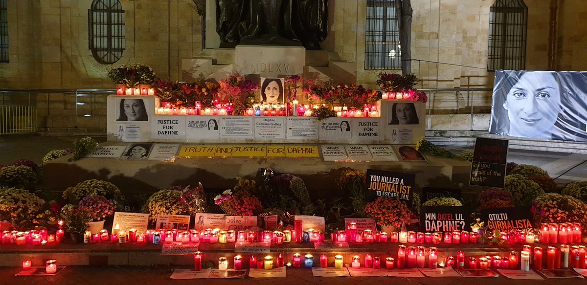 occupyjusticema's tweet photo. #MemorialWatch The beautiful memorial following the protest on #2year anniversary of #DaphneCaruanaGalizia's assassination was cleared by @OwenBonnici's minions last night. And rebuilt this morning @johnsweeneyroar @fluturakusari @rebecca_vincent @AlexCrawfordSky @RSF_inter https://t.co/kbpJCuNZA4
