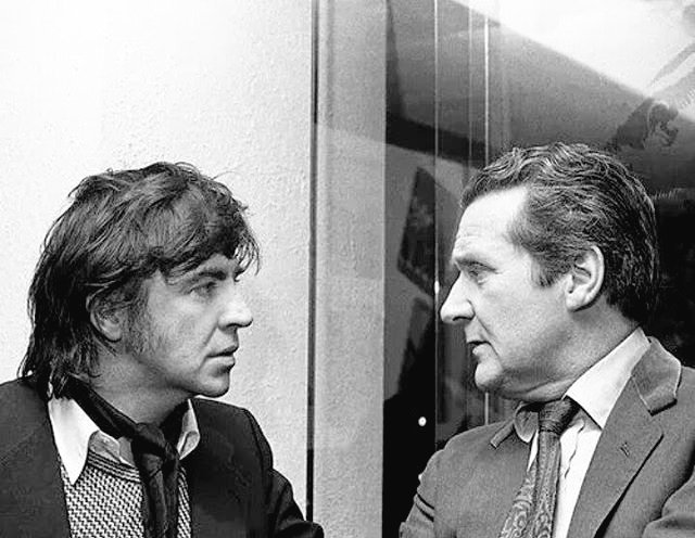 A clash of styles when #AlanBates and #PatrickMacnee  meet at #EthelMerman's birthday party in 1973.