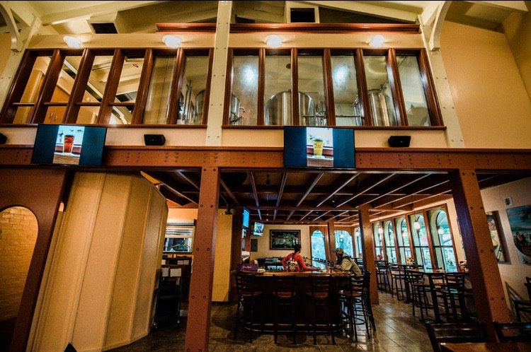 StJohnBrewers's tweet photo. Take a peek in to our third floor #brewery while you enjoy a meal or #stjohnbrewers #draftbeer at the #taproomVI located on the second floor of Mongoose Junction right upstairs from our merchandise shop the #brewtique! https://t.co/Rp8dA5sLyA