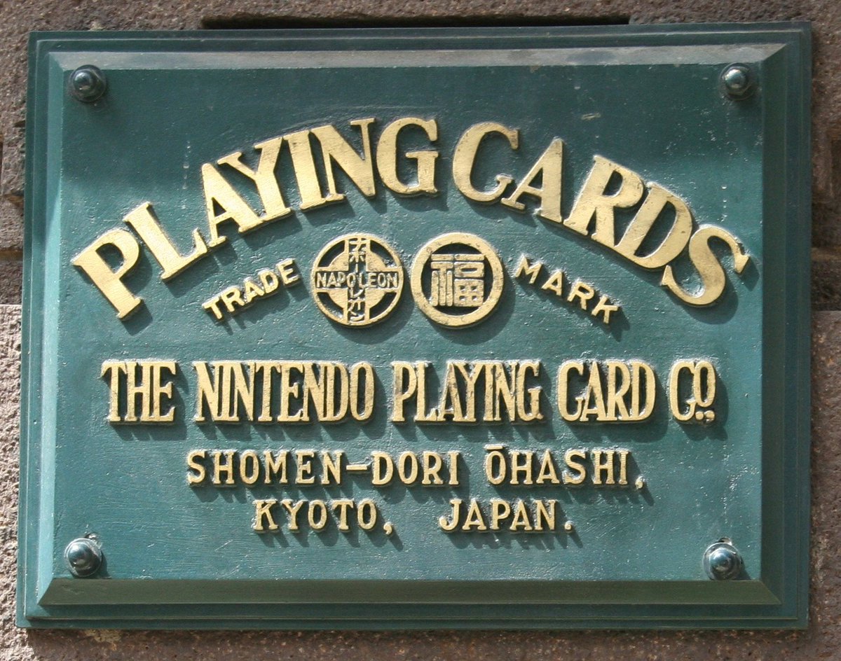 A plaque of the original Nintendo HQ which says Playing Cards