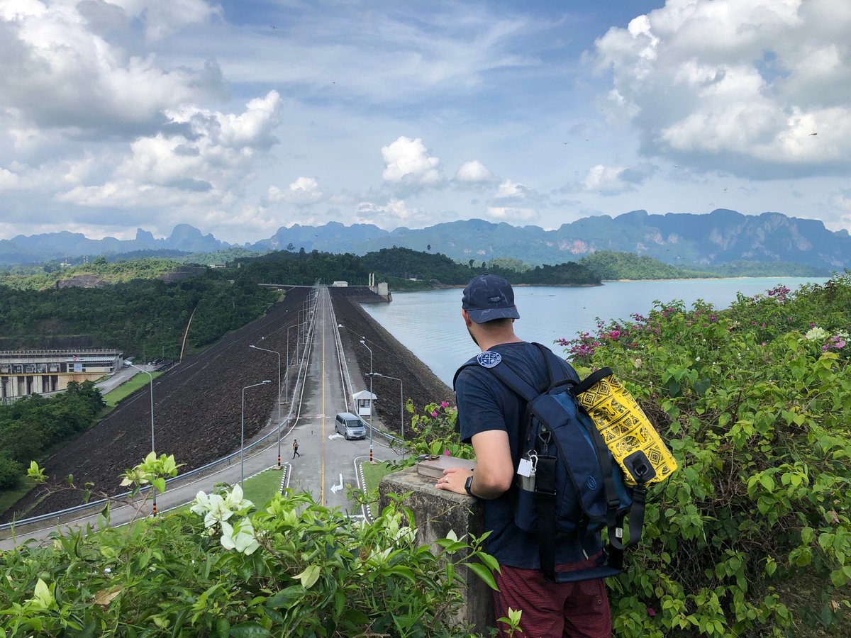 DyerEngineering's tweet image. DEC Patch sighting! One of our patches recently traveled all the way to Thailand, stopping to overlook the dam at Cheow Lan Lake. We love seeing our team representing our company no matter where they are ✈️ #bestplacetowork