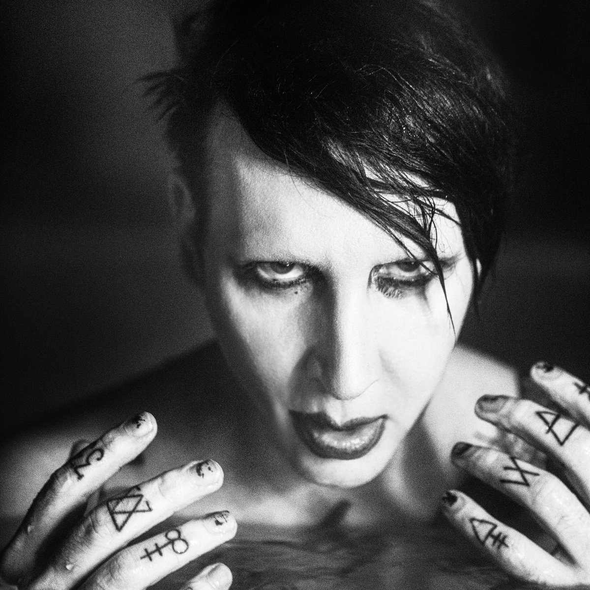marilyn manson god will cut you down