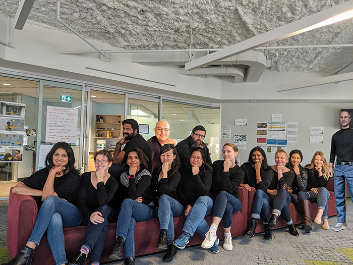 sprintmarathon's tweet photo. #TFW a bunch of people in the office pose for the most epic #wallofsame shot, but you're working from home so 
@photojennylee shops you in. #winning https://t.co/wBM7ykM9St