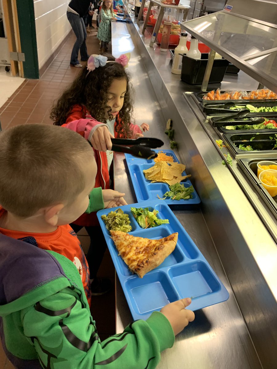 Kinder_StGelais's tweet photo. Showing our STRIPES by helping friends to put salad on their trays #tpsprepares https://t.co/5jPbTTYiGD