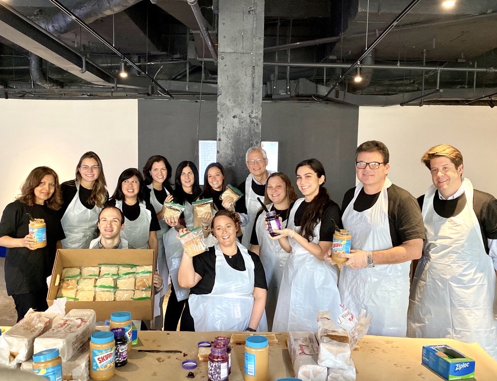 RockGroup's tweet photo. We recently held our second annual PB&J day in support of St Francis Food Pantries, where our team prepared over 1,900 sandwiches — making a difference one meal at a time. #StFrancisFoodPantries #stFFP #RockefellerGivesBack https://t.co/1O2XdoTDZh