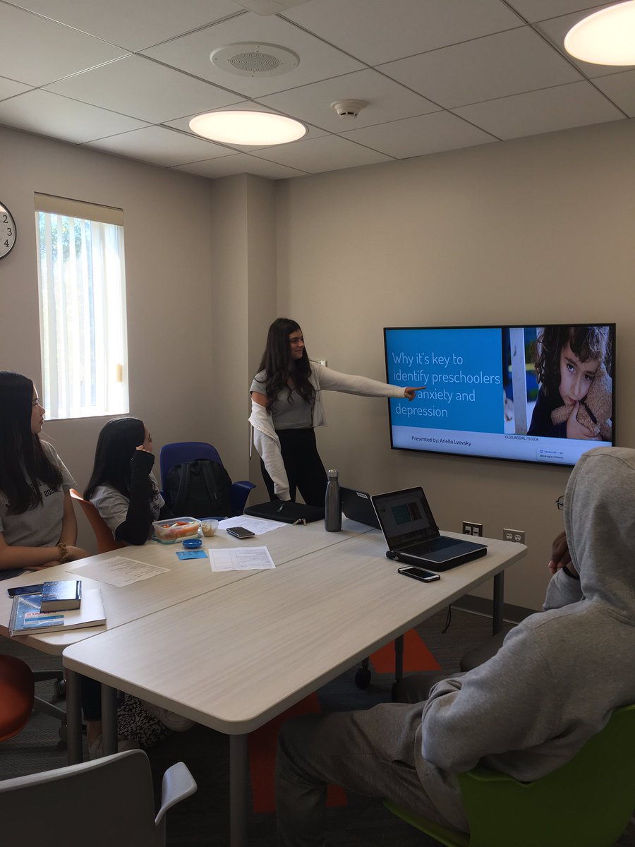 SciResearchAHS's tweet photo. 1st year AHS Science Research students use new library small group rooms to work on presentation skills. Senior research students provide valuable feedback and encouragement. https://t.co/FaZ3TS7Vy4