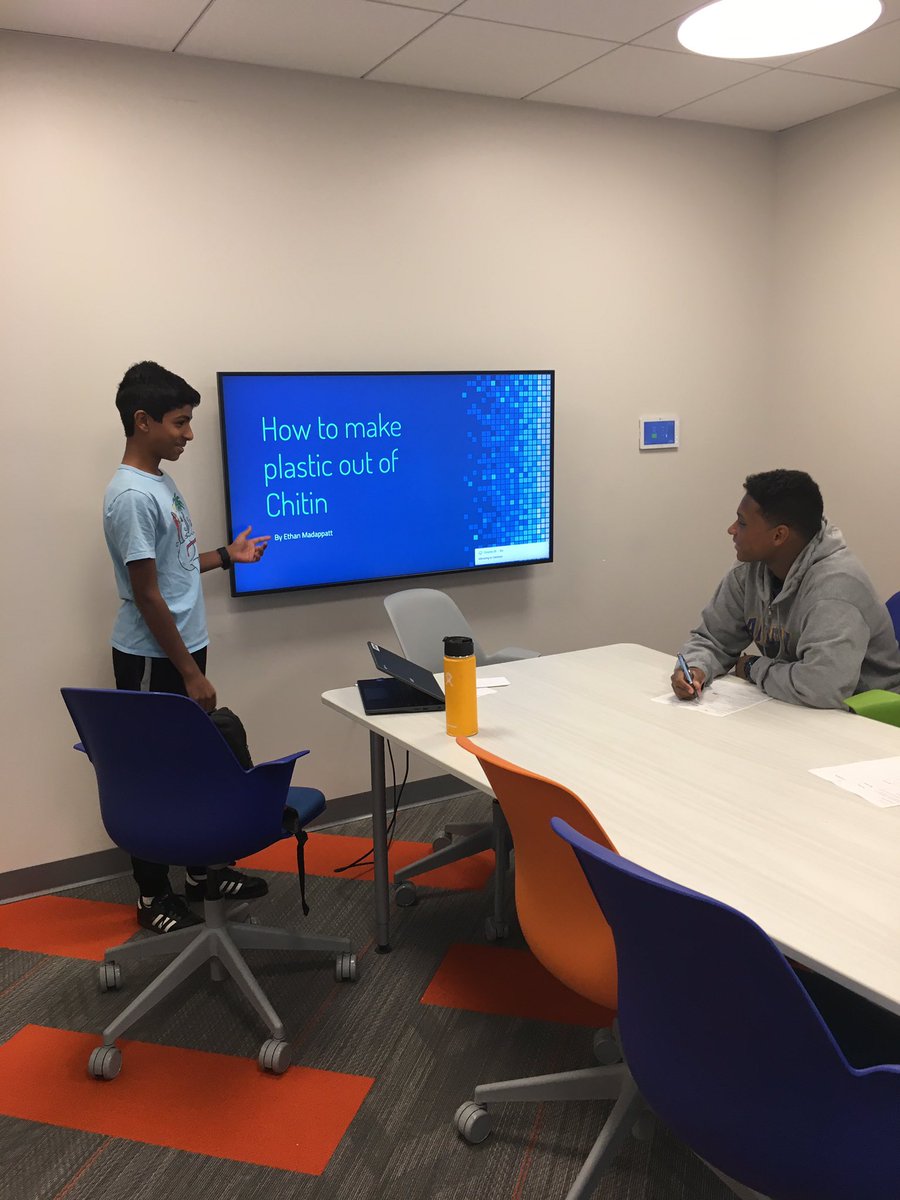 SciResearchAHS's tweet photo. 1st year AHS Science Research students use new library small group rooms to work on presentation skills. Senior research students provide valuable feedback and encouragement. https://t.co/FaZ3TS7Vy4