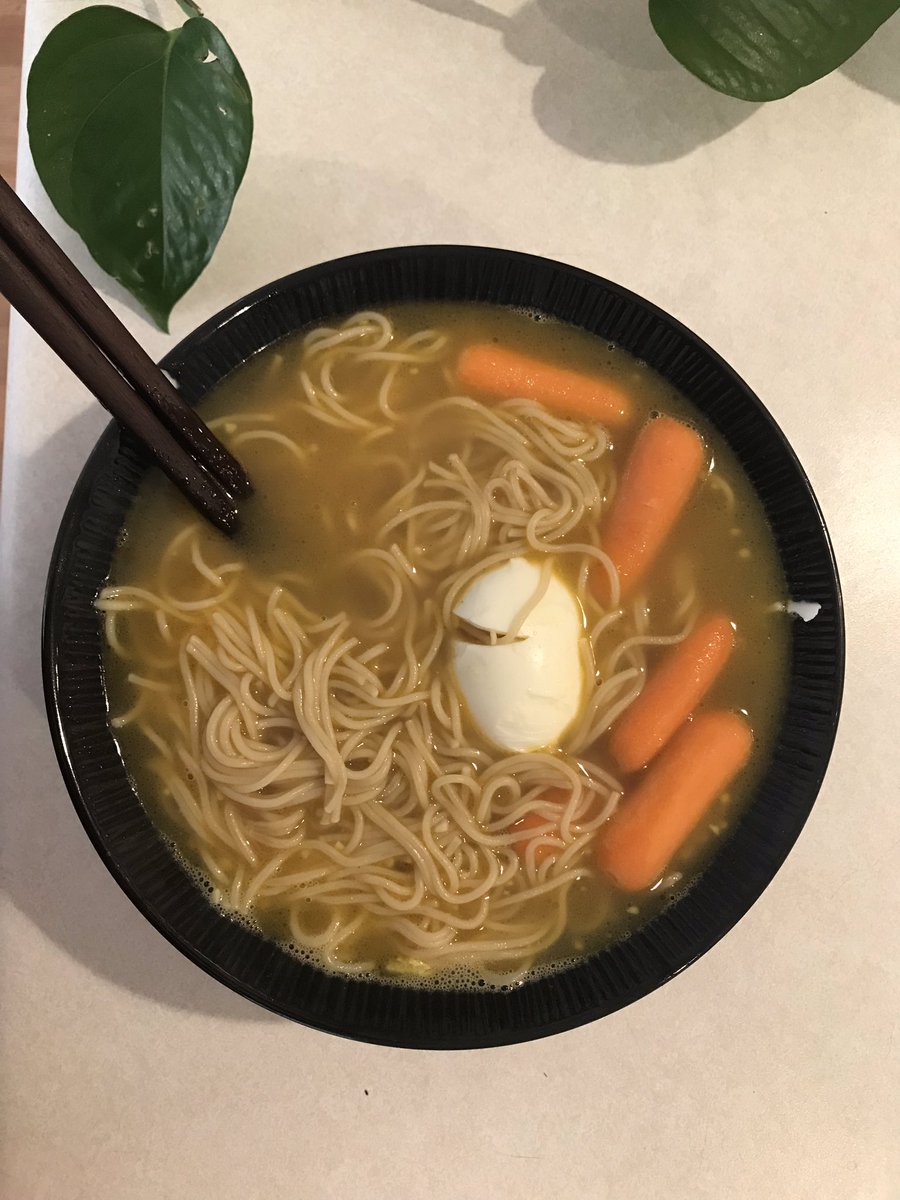 Violinagin's tweet photo. A weird ramen with Cajun and Indian flavors. Because I’m too lazy to go to the store and get proper food and spices. Start your broth with the trinity, season with curry, soy sauce, and butter. Top with tabasco and add pepperoncini flavored carrots. Tangy and spicy. Gluten free! https://t.co/DXGb8XK5Gl