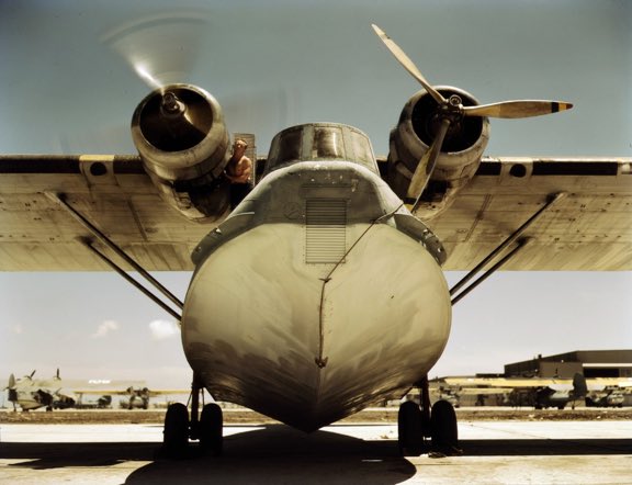 BarbaraPAuthor's tweet image. Close-up of the nose of a PBY Catalina aircraft being serviced at Naval Air Station Corpus Christi, Texas, United States, August 1942. #WW2 #Aircraft #PBYCatalina #Texas