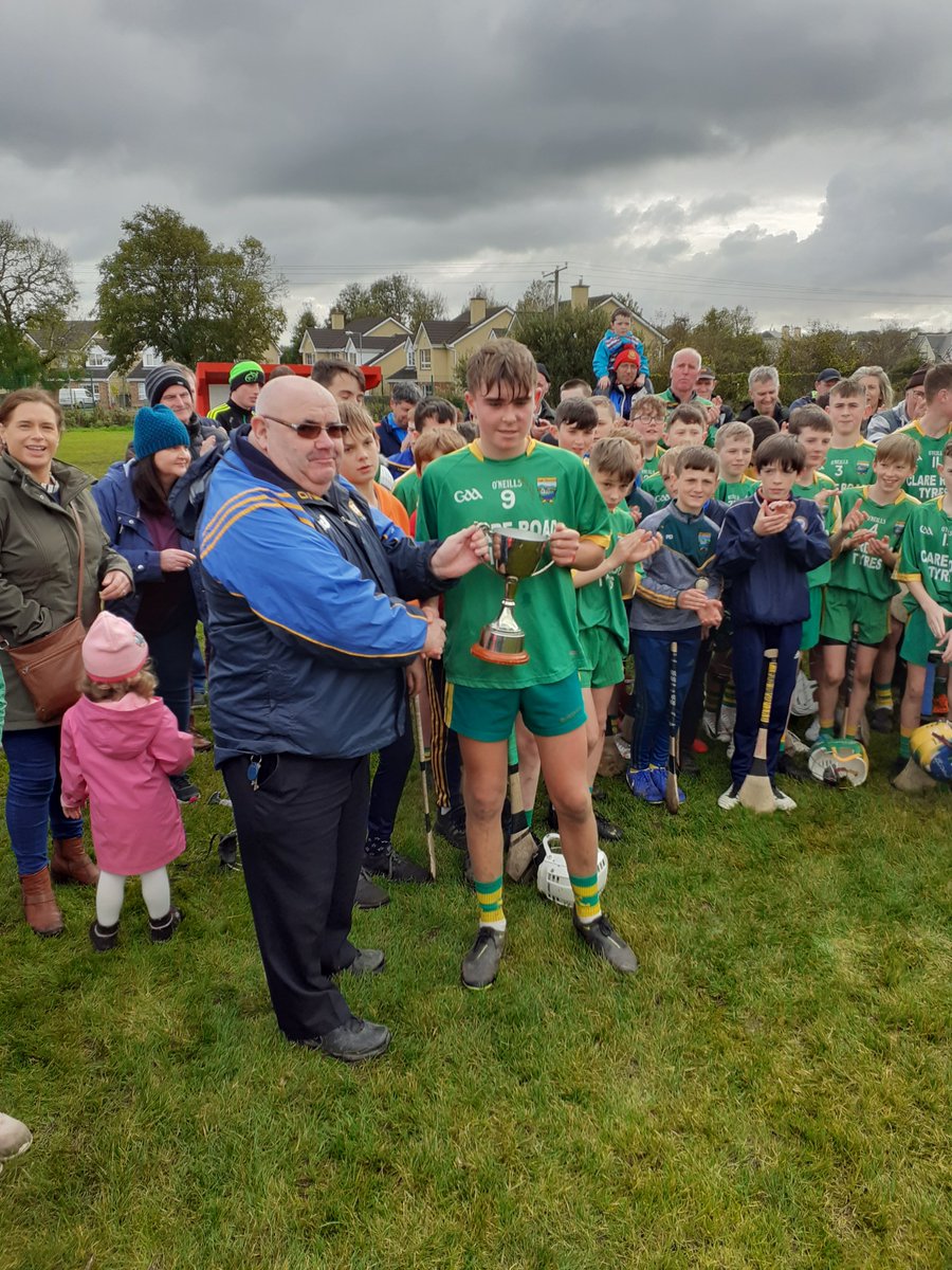 <a href="/inagh_kilnamona/">Inagh Kilnamona GAA</a> <a href="/SMBGAA/">Sixmilebridge GAA</a> Tom Sheehan presents the <a href="/GaaClare/">Clare Gaa</a> U13A Christy Sheehan Cup to <a href="/inagh_kilnamona/">Inagh Kilnamona GAA</a> captain James Hegarty