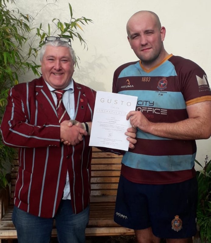 CampHillRugby's tweet photo. Full Time Score from #TheShrine is 1XV (50) @candnrufc (27) - Cheers to C&amp;N for the game, have a safe journey home - Head of Grounds @paulmooremotors presents  @dangrady1 with his @gusto_uk Man of the Match Award. https://t.co/Fo1B112Cf7