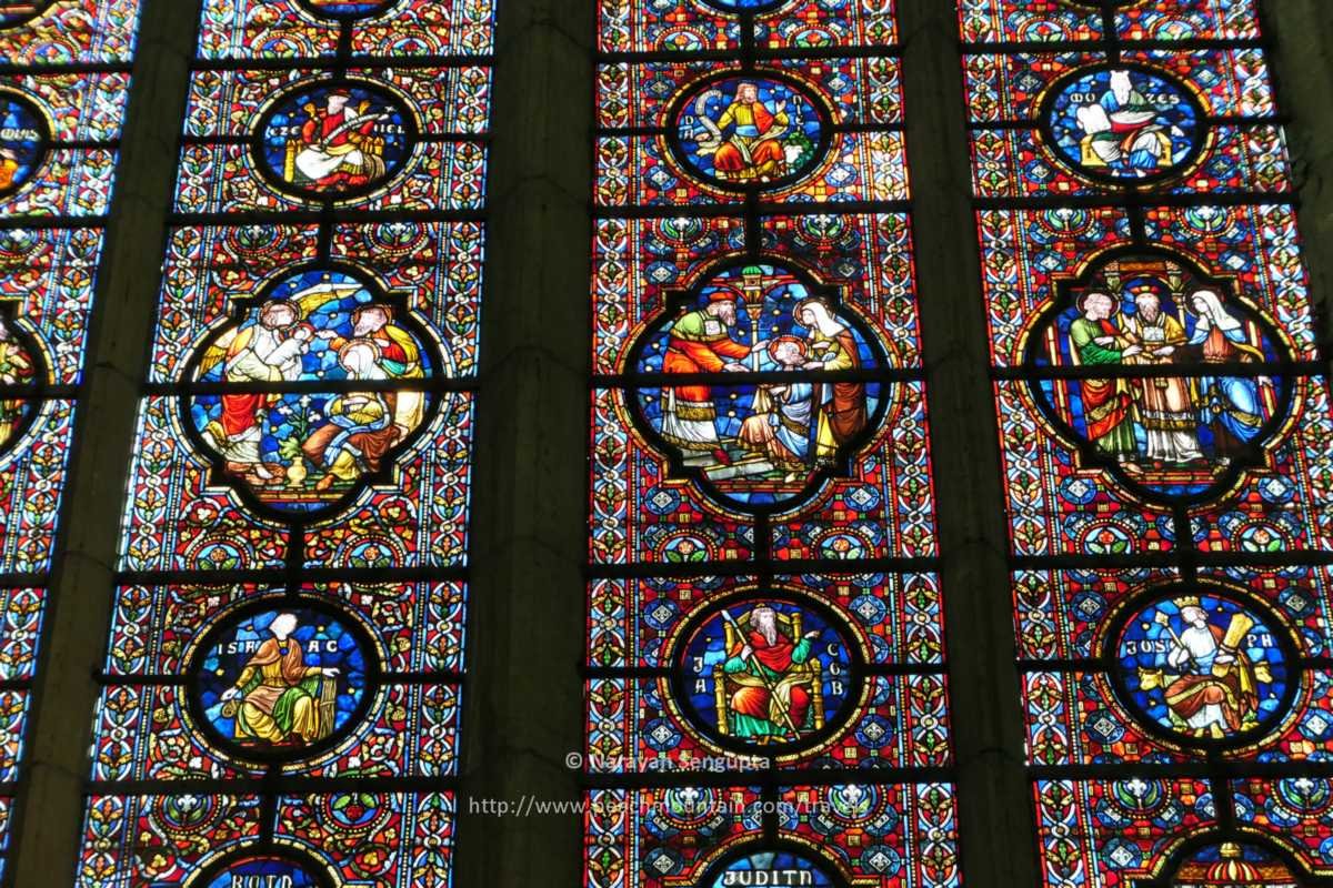 3/  #Dinant  #Belgium - lovely 12th C  #NotreDame de Dinant cathedral sits on site of older 10th century Romanesque church destroyed by boulders falling from adjacent cliff. Voila the beautiful south stain glass window, supposedly the world's largest!