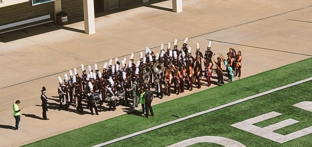 Bovinamenchaca's tweet photo. Today our Bowie HS band competed against other bands from surrounding areas.  Here they are about to go on e the field.  This journey started a long time ago, and culminated today when they received the highest rating a band can make, WE GOT A ONE!  Congrats Jackrabbit HS band!!! https://t.co/IwwPIs8B6N