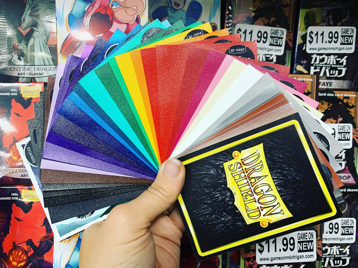 GameOnMichigan's tweet image. Need #CardSleeves to protect your deck? Check out our wide assortment of @DragonShield_ #DeckProtectors! 

We received this awesome #swatch kit of every shade in stock from the @AllianceGames Open House and it TOTALLY makes picking your sleeve shade that much easier.
