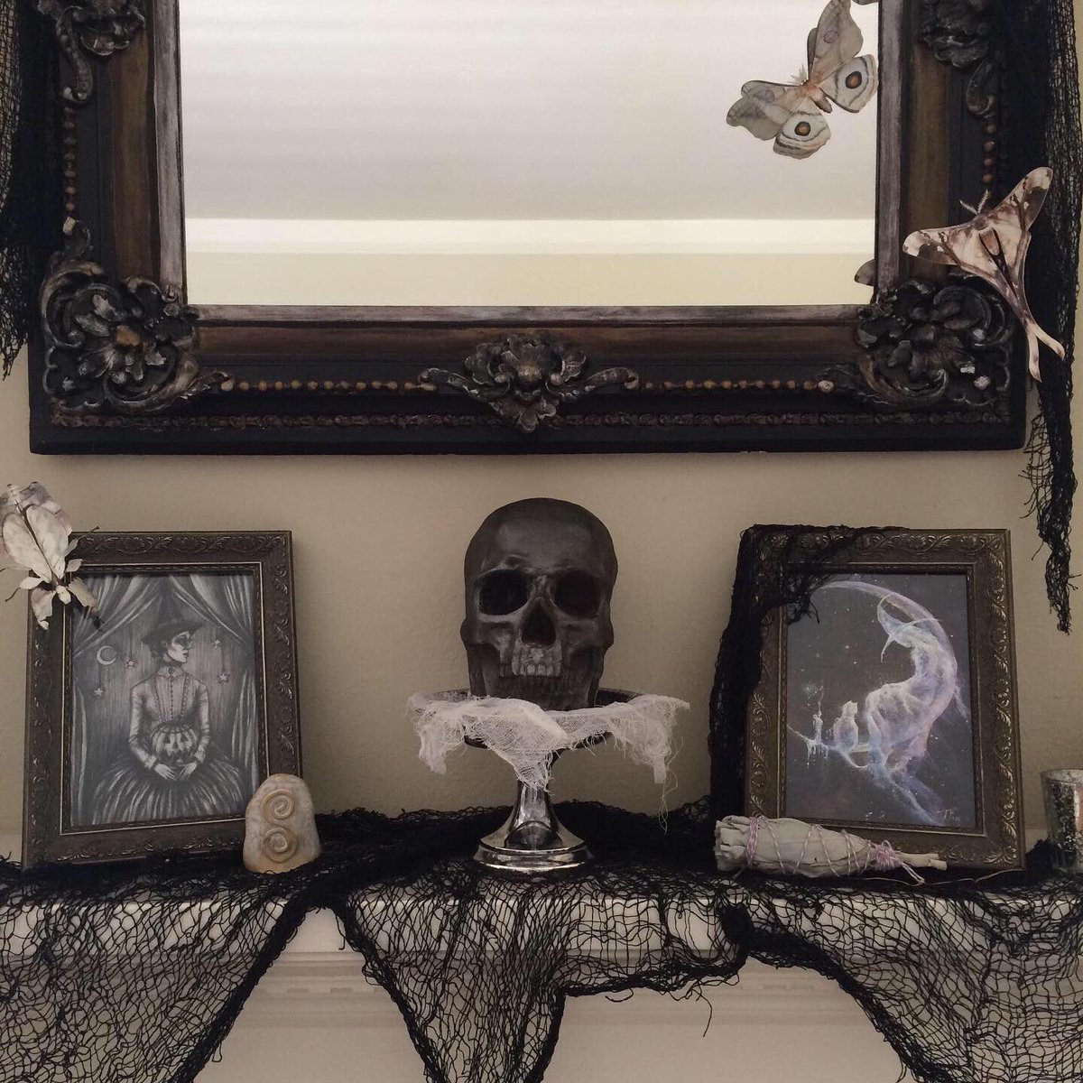 EvilVines's tweet photo. Our spooooky mantel.  Watch my stories for more of our indoor Halloween decor. ⁣
⁣
#12daystohalloween #spookymantel #halloweenmantel #manteldecor #halloweenhouse #halloweendecor #darkartists #paperbutterflies #vintagemirror #homegrown #smudgestick #makingmagic ⁣ https://t.co/c7spmgL6zw