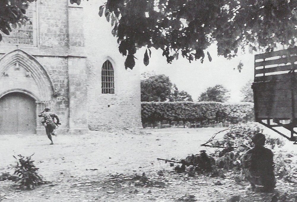 DDayCenter's tweet photo. Then and Now in #Normandy - Sainte-Mère-Église church on #DDay. #ww2 #history https://t.co/VXvuofFFni