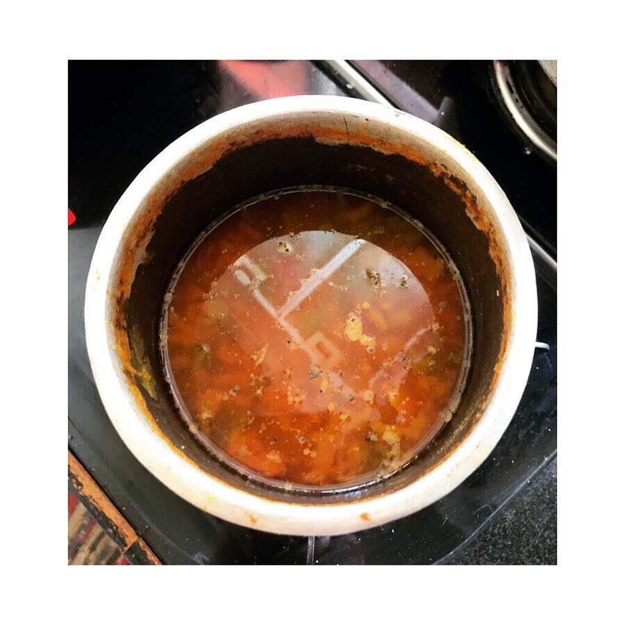 A traditional tin Rasam pot called a Eeya Paathram. (This one is my MILs, bought from a shop in Kumbakonam) The tin alloy the pot is made of has a low melting point & pots are known to melt into a ball of alloy if kept on fire without water/rasam in them!