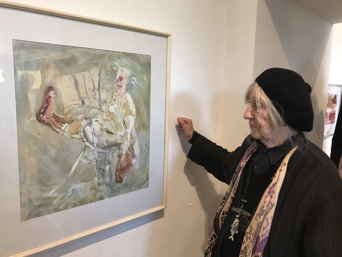 BollAchill's tweet photo. What a tremendous exhibition @customhousestud #Westport #Mayo by #Achill artist Camille Souter. Here she is by one of her wonderful #circus paintings of @duffyscircus musical clown on slack rope @MayoArtsOffice @Westivalirl https://t.co/P2rz4R1Aj8