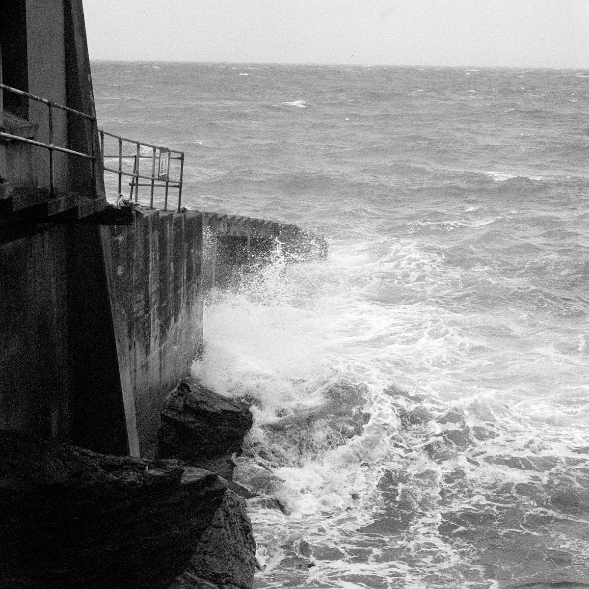 Coastpics1's tweet photo. Stormy seas at the old Lizard Lifeboat station. Shot back in July this year on film using Adox Scalia -develop and scan by @silverpanlab #mycoast #coast #filmisnotdead #adoxfilms #silverpanlab #lizardcornwall #cornwall #monochrome #blackandwhitephotography #lifeboats #adoxscalia https://t.co/cZBbepZTKF