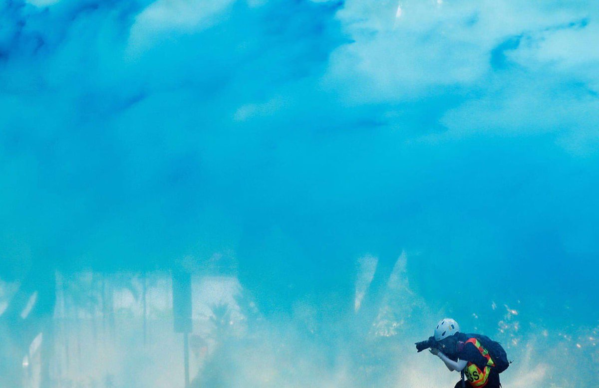 A <a href="/Reuters/">Reuters</a> photo featuring <a href="/SCMPNews/">South China Morning Post</a> producer Shan Shan Kao which also shows the difficulties journalists face when covering #hongkongprotests. She was hit by water cannon twice today by <a href="/hkpoliceforce/">Hong Kong Police Force</a> in TST and MK, when there were no protesters around her in both occasions