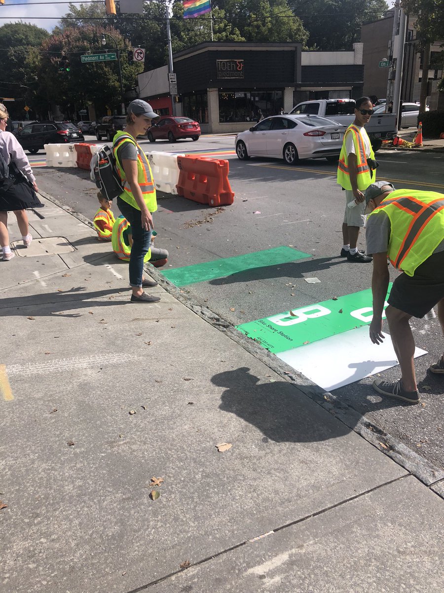 ATLCityStudio's tweet photo. Working on the pop up bike lane on 10th today! #saferstreets #atlcitydesign https://t.co/ZkZGIu5P3E