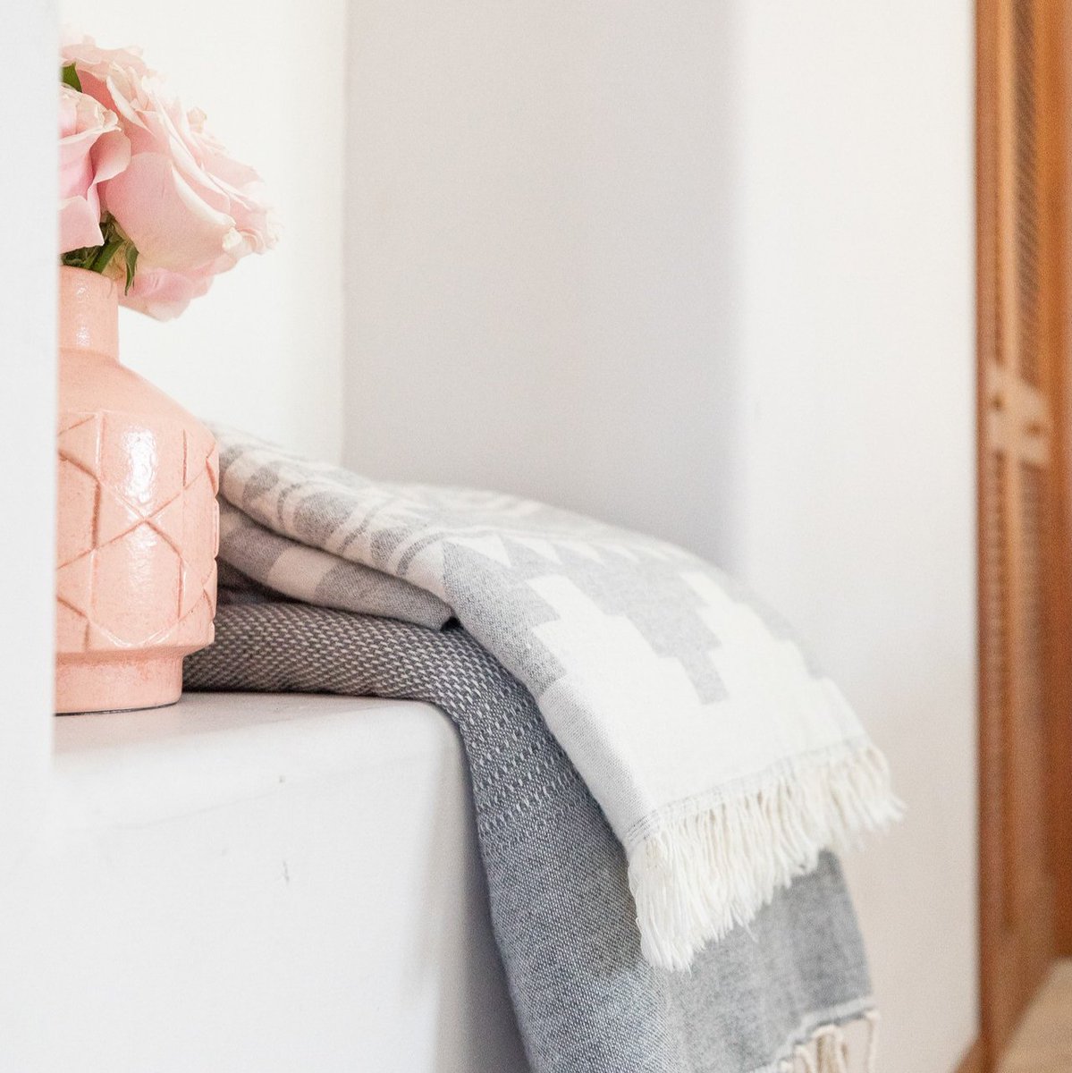 Lambswool and cotton make a blend that is lightweight, warm, and non-itchy. Its quality elevates any room. #LOVE⁠