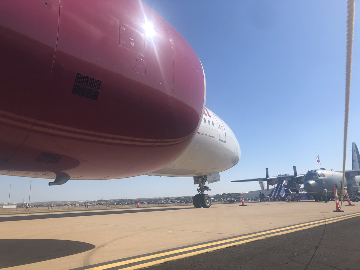 rangersbrit's tweet photo. Found some shade under the engine of a 777-200 at the @AllianceAirShow. Just saw a flawless display by the @BlueAngels #needsunscreen https://t.co/KNnOhr4KpJ