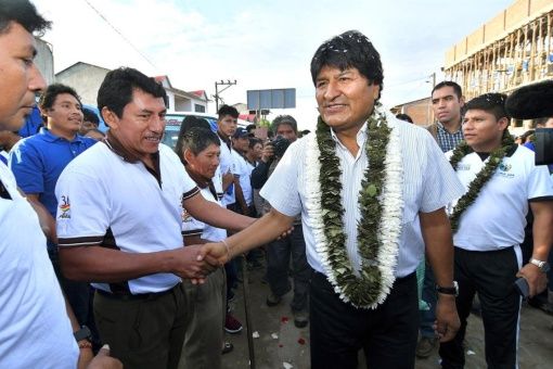 Evo Morales wins first round of election in Bolivia.