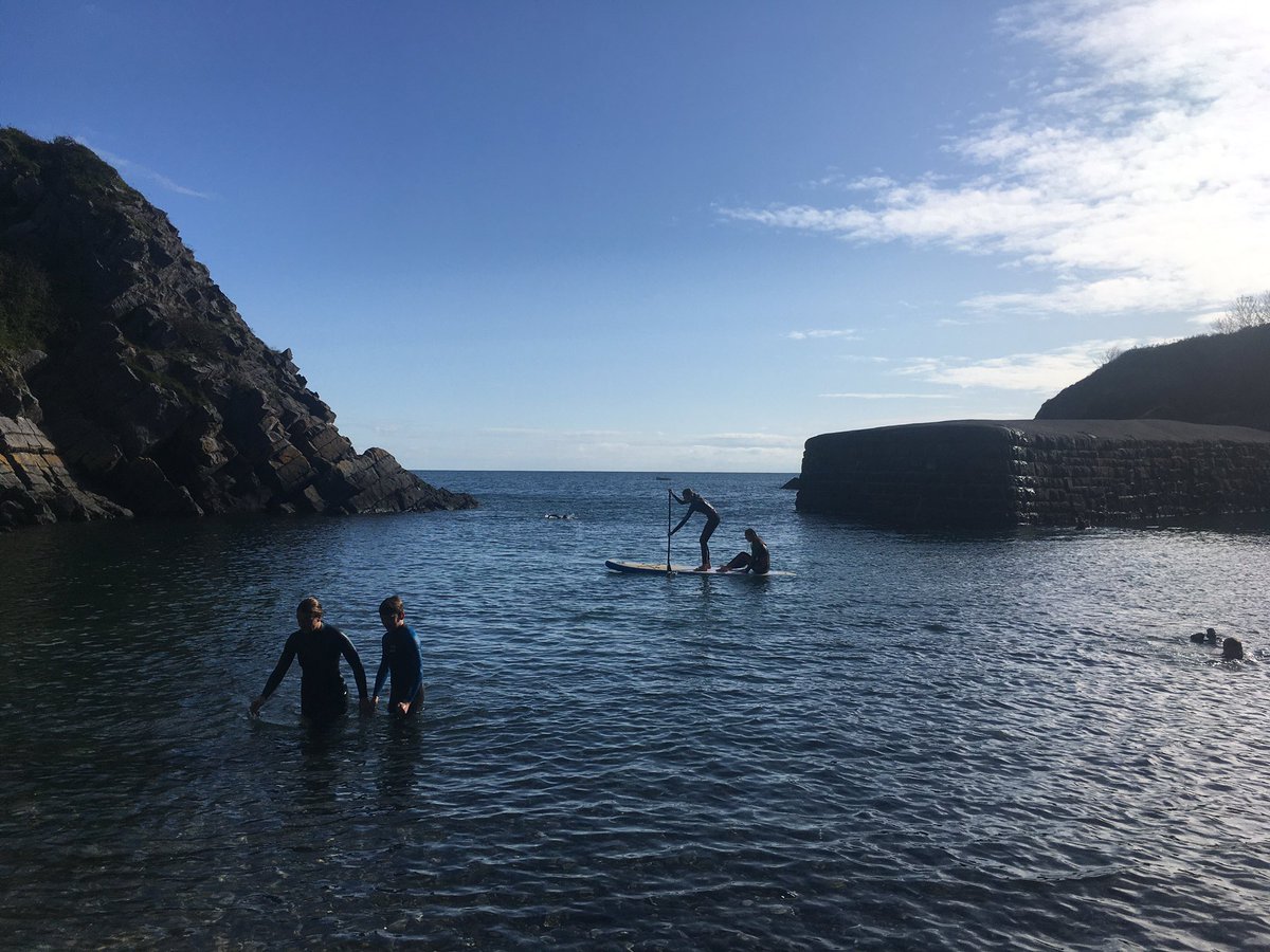 CREducATE's tweet image. Arrival at @NTStackpole quay. Rest of family (&amp;amp; Ollie’s girlfriend) enjoying the rare Autumn calm and some #SUP #paddleboard and quay jumping. #perfectwalk #walktober
