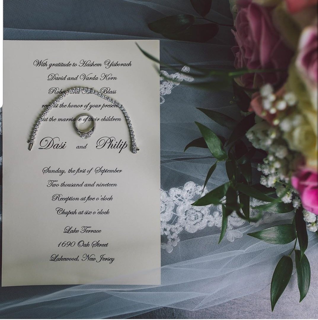 The hall of choice for upscale Jewish weddings is of course LAKEC TERRACE!

Beautiful shot by @binyaminkornphotography proudly memorializing the wedding invitation and the wedding venue!

#simcha #mazeltov #kallah #chosson #jewishwedding #chuppah #weddingring #simchos #chasunah