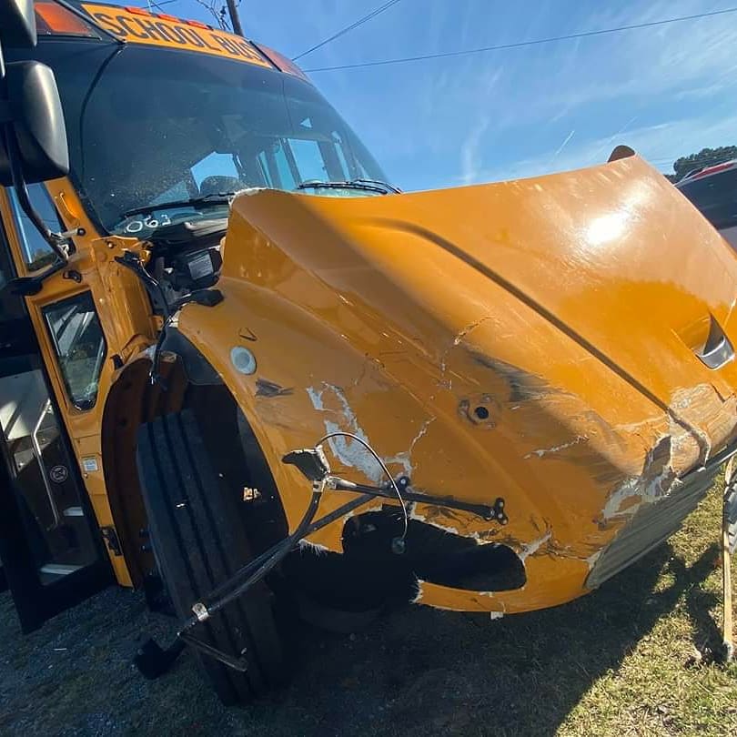 DuluthGaPolice's tweet photo. HAPPENING NOW | #DuluthPolice along with Gwinnett Fire responded to this crash on Buford Hwy involving a school bus and this truck.

The driver of the truck was transported to the local hospital.

No children on the bus were transported. https://t.co/OicN5slIcC