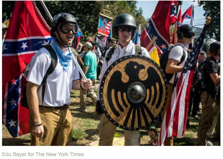 The black eagle was used in Nazi Germany & is still being paraded around in far-right circles, although as  @medievalpoc pointed out here, it's the symbol of St. Maurice.  https://bit.ly/2W0Xigd  Take a long, look at who he was and he has been depicted throughout history. 4/19